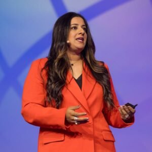 Sara the dentist is smiling while performing her speech