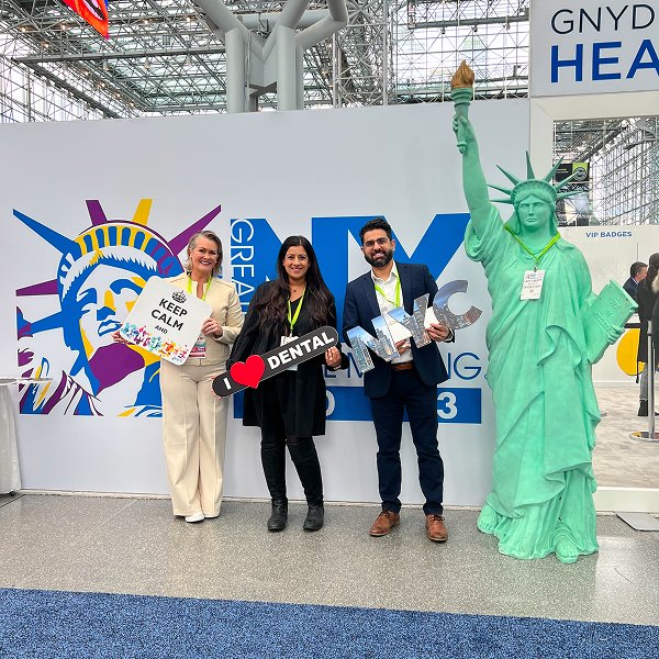 Doctor Sara is smiling with her friends at conference